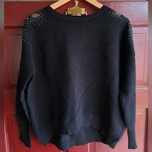 Black sweater with horizontal ribbing, silver studs